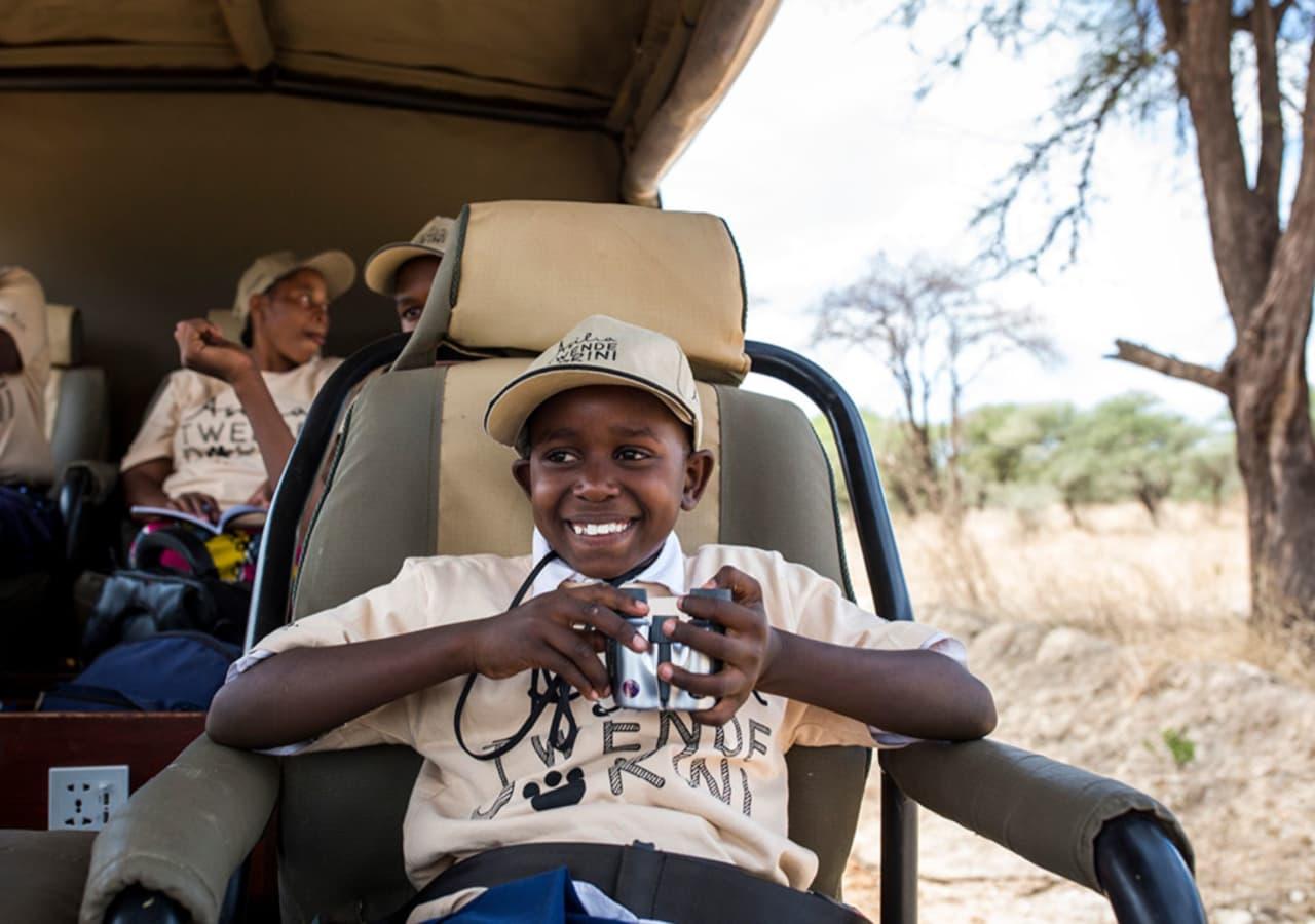 Child game drive at Asilia Olivers Camp