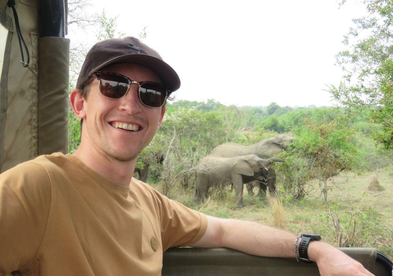 Brandon in Botswana with Elephant