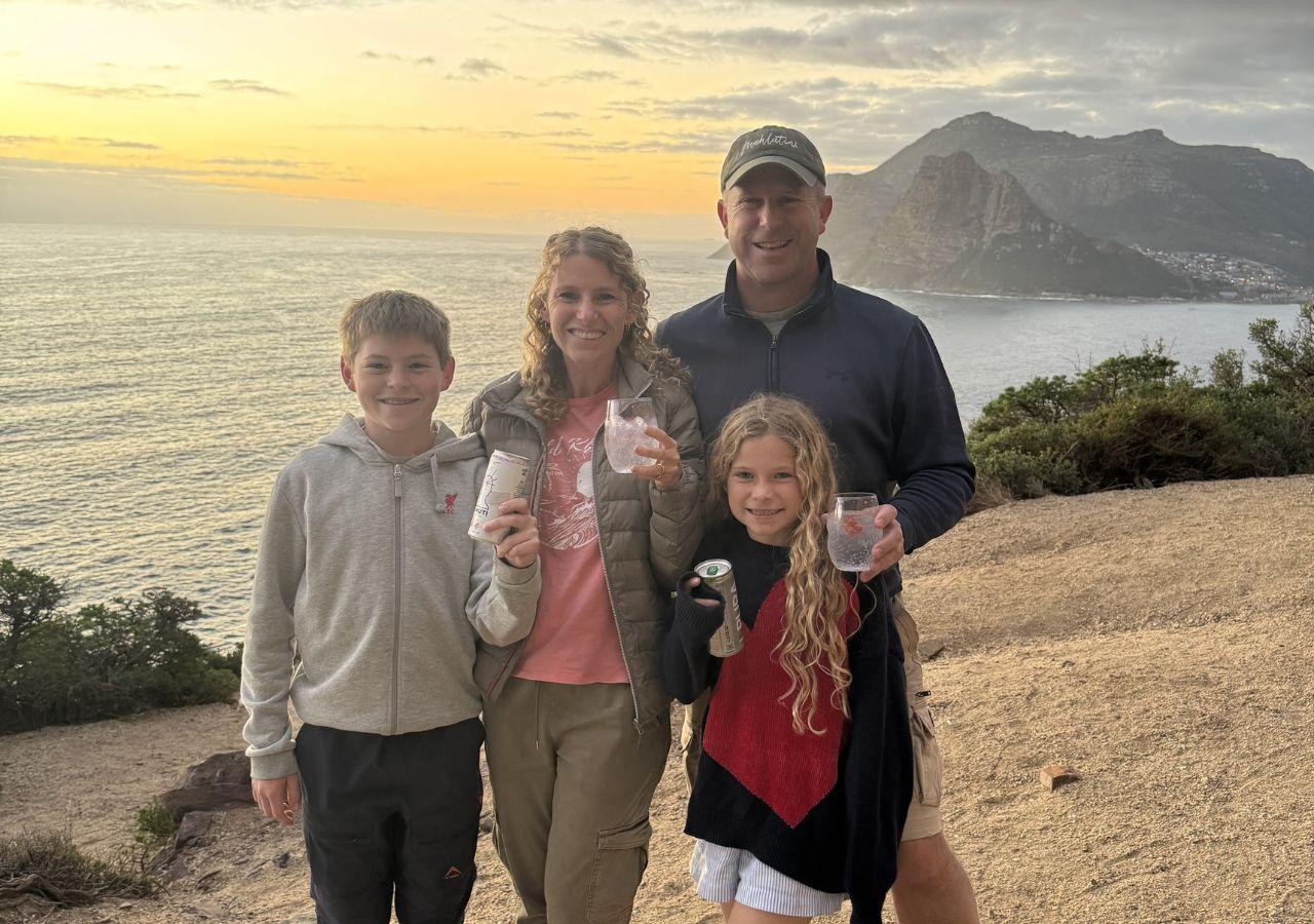 a family enjoying sunset drinks in Cape Town