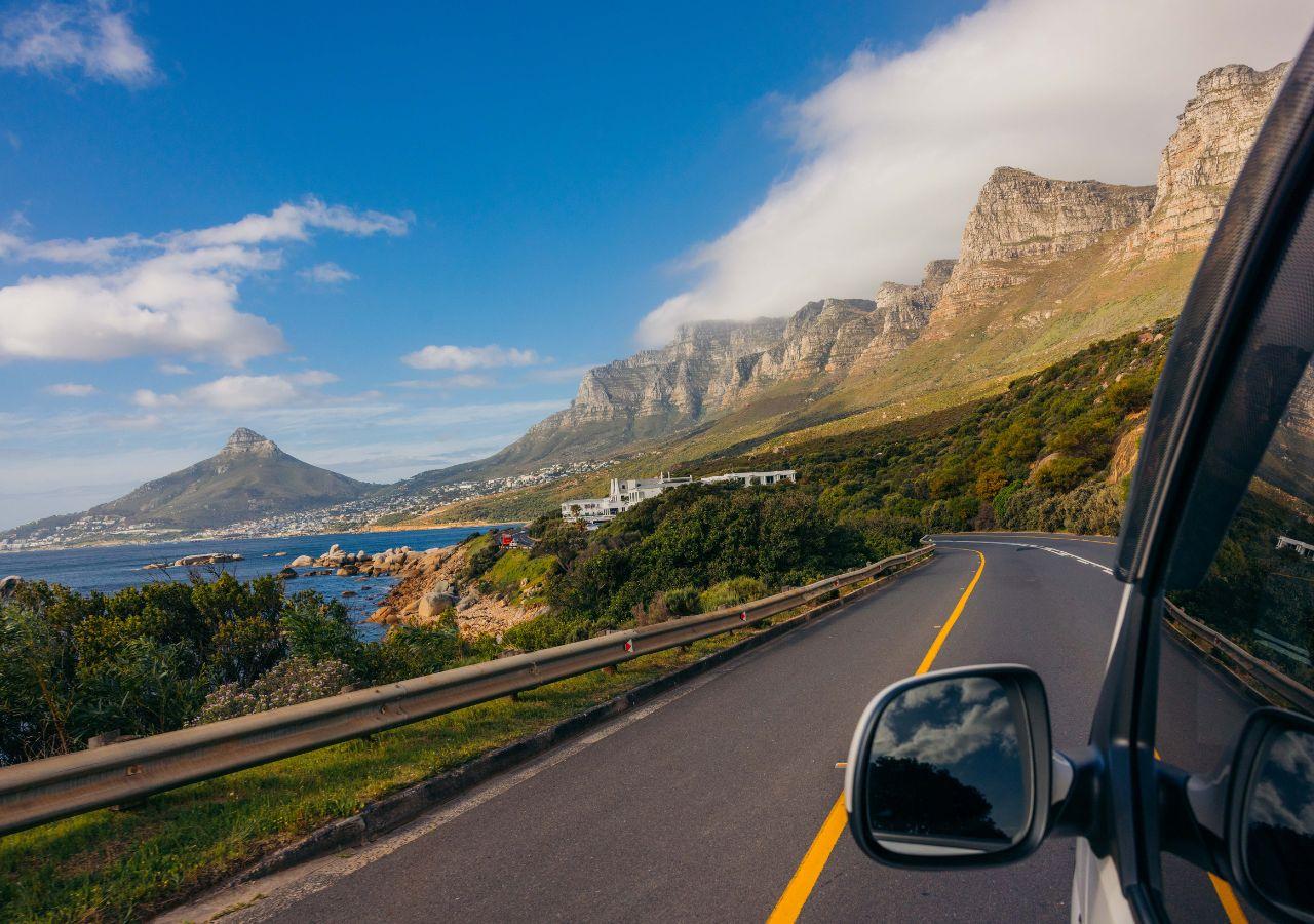 Car driving along Chapman's peak in Cape Town South Africa © Mahlatini Luxury Travel