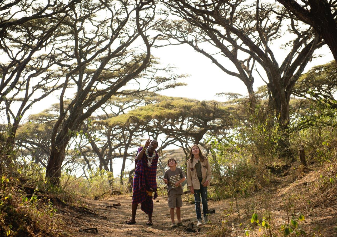 family on a culture walk in tanzania