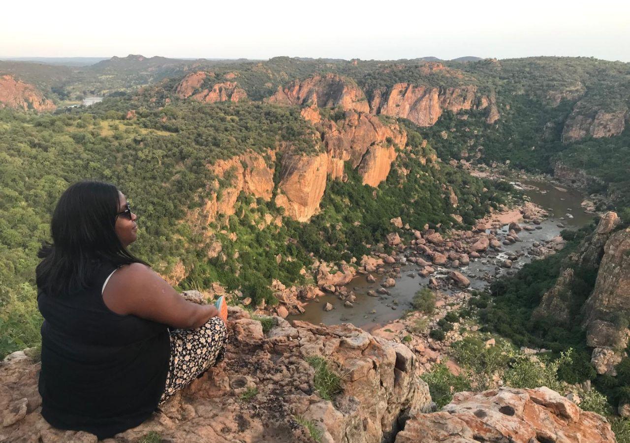 Grace looking at a beautiful view in Africa