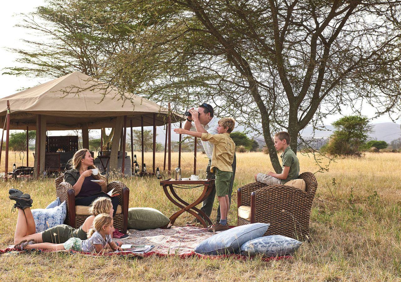 A family picnic at a mobile safari camp