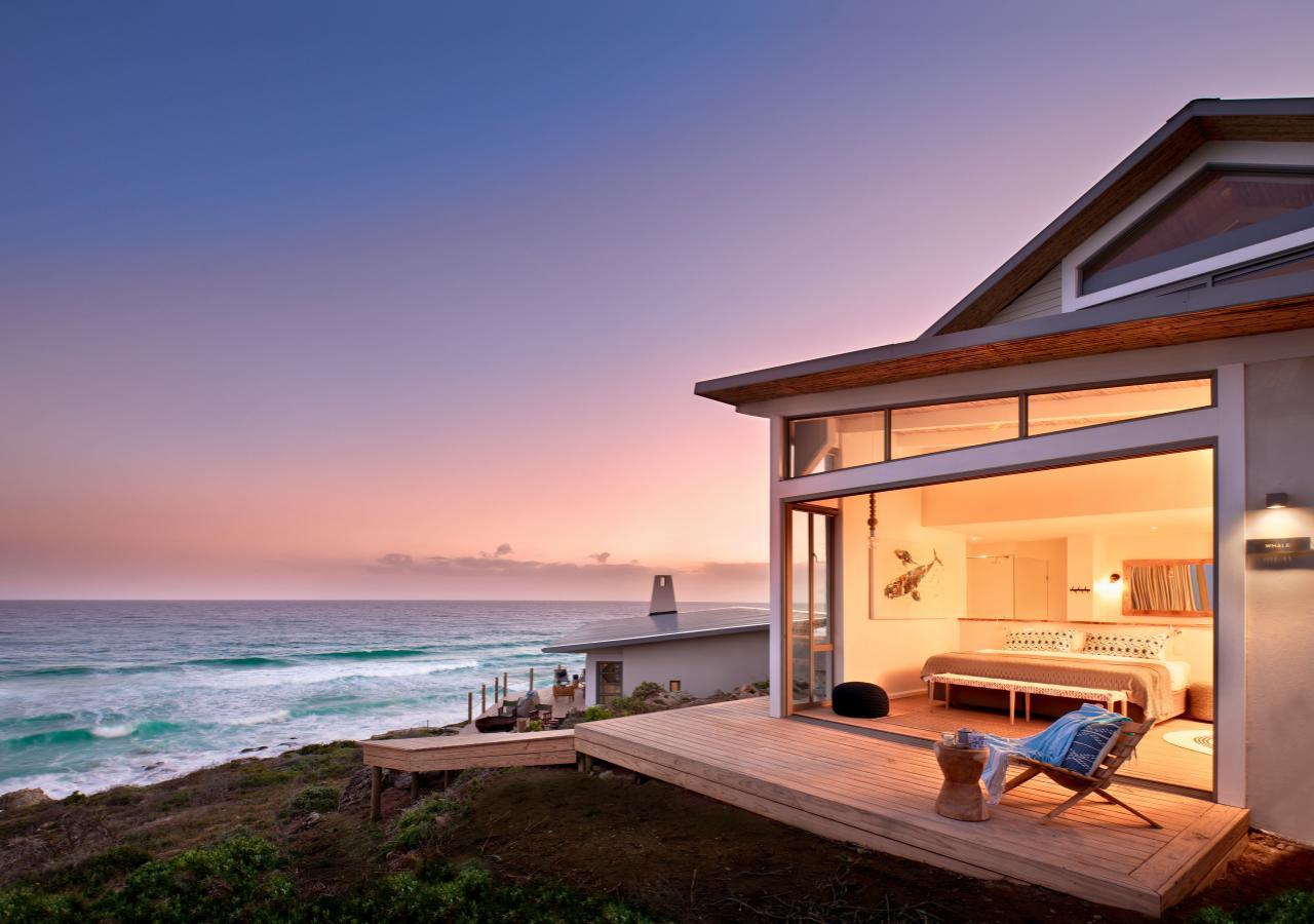 bedroom with ocean view at Lekkerwater Beach Lodge