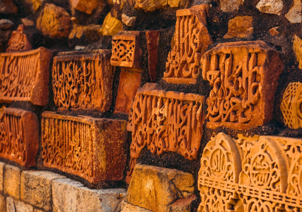 Up-close shot of walls of Qutub Minar in Delhi India