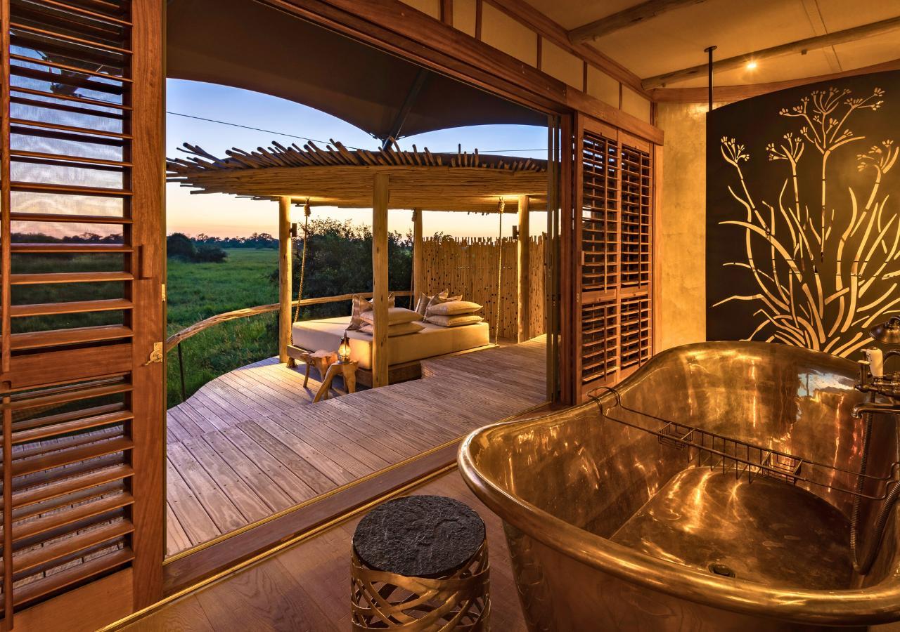 deck and bathtub with a view of the Okavango Delta