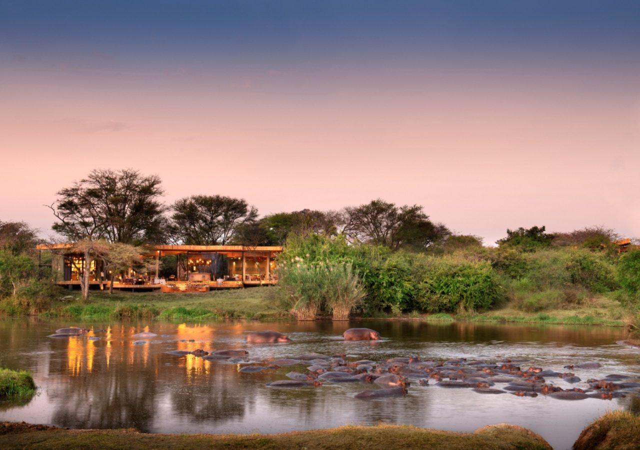 Grumeti Serengeti River Lodge Exterior and Hippos