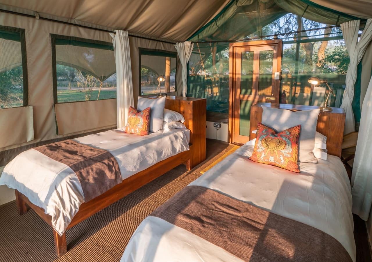 A tented twin bedroom