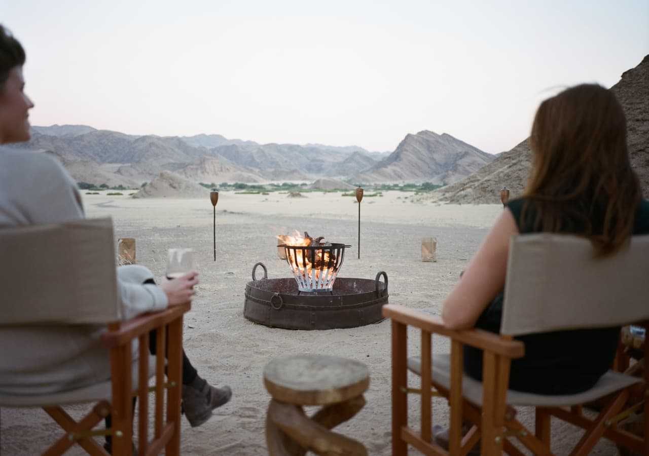 B evening drinks around the camp fire