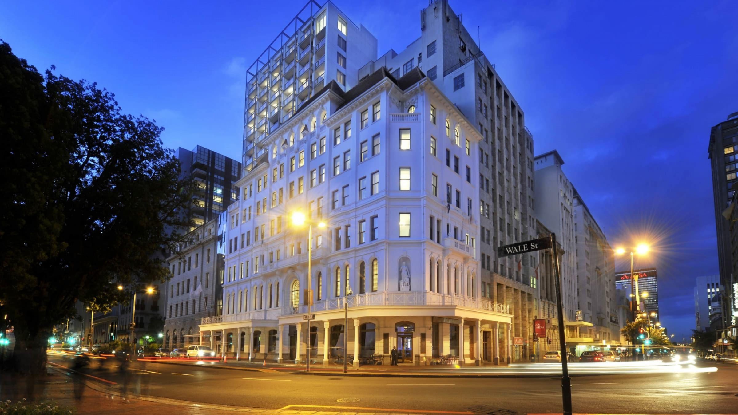 H exterior view of the hotel at night