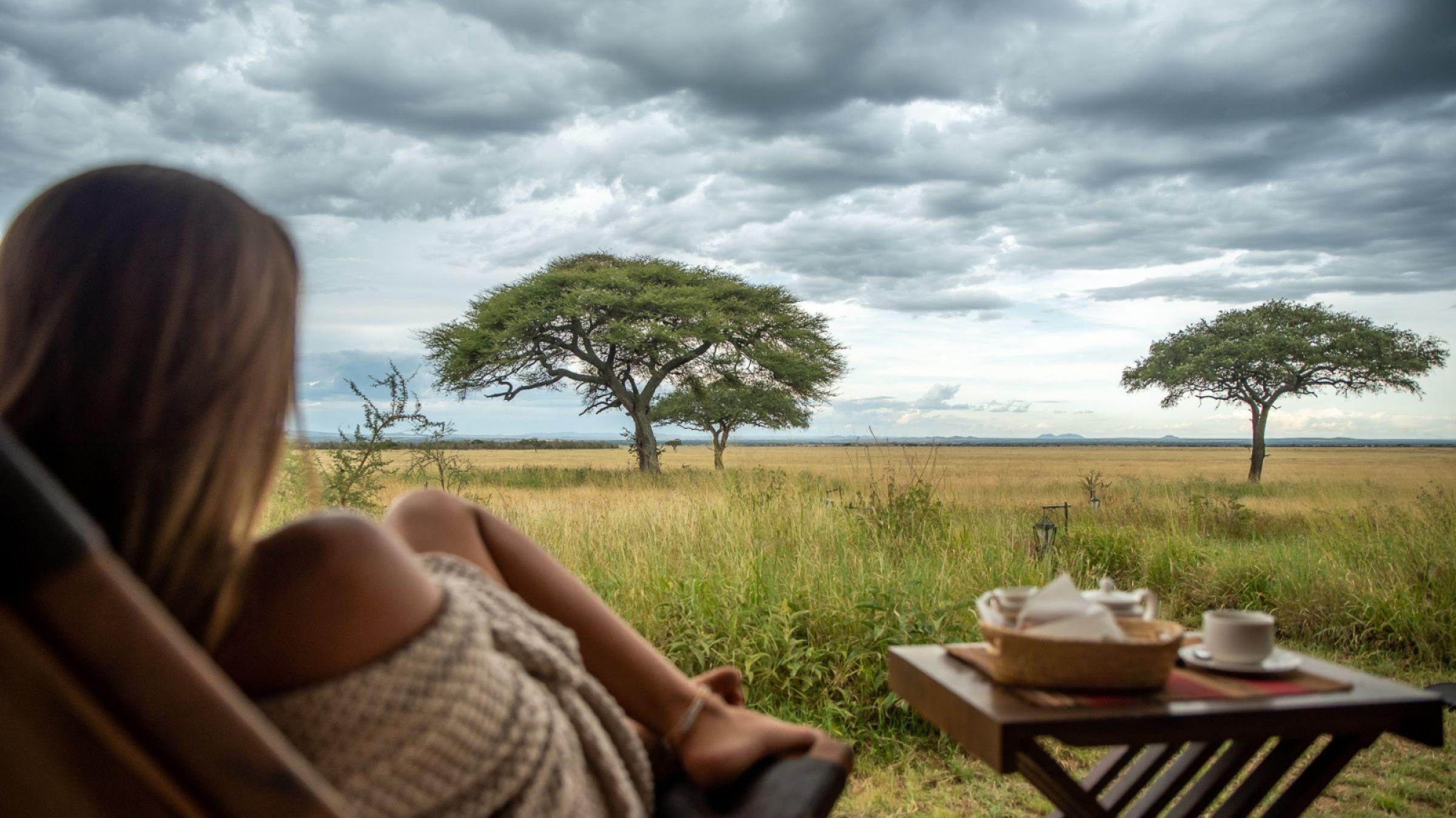 Cherero Camp Hero - woman looking out on to serengeti