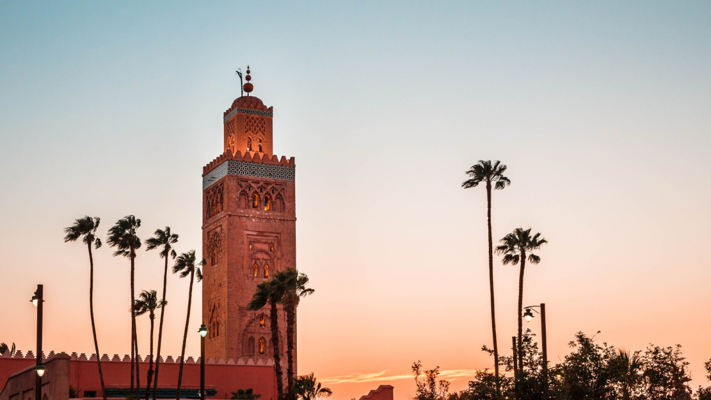 Marrakech mosque silhouette sunset