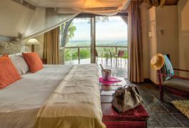 Muchenje safari lodge bedroom interior and view from the deck 1280