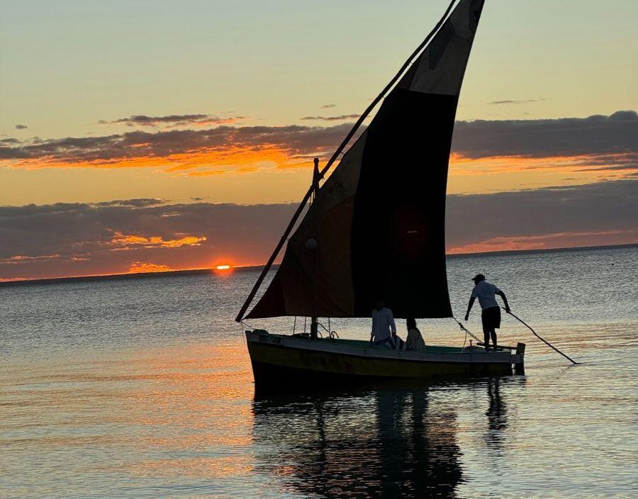 Traditional sail boat at sunset in Mozambique