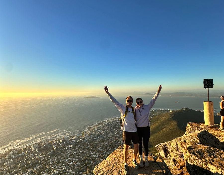 Couple pose on top of Lions Head in South Africa