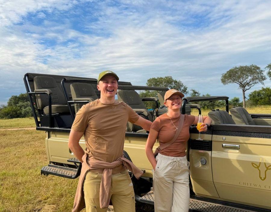 Couple pose on safari