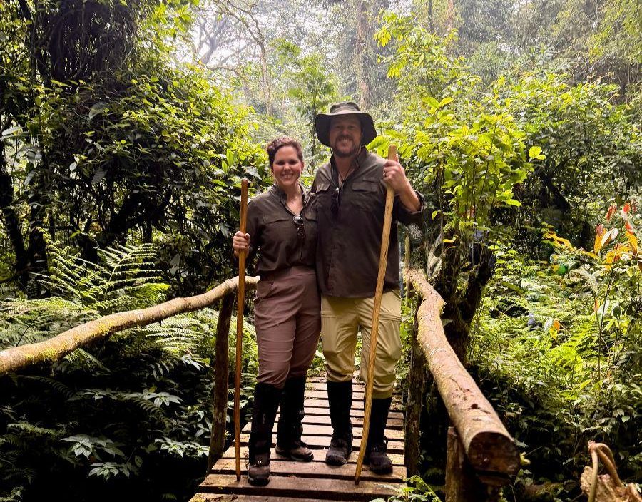 Couple pose in Bwindi National Park Uganda