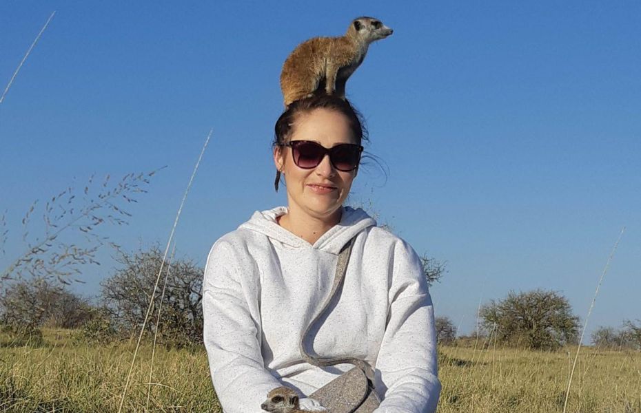 Mongoose standing on top of Meike's head