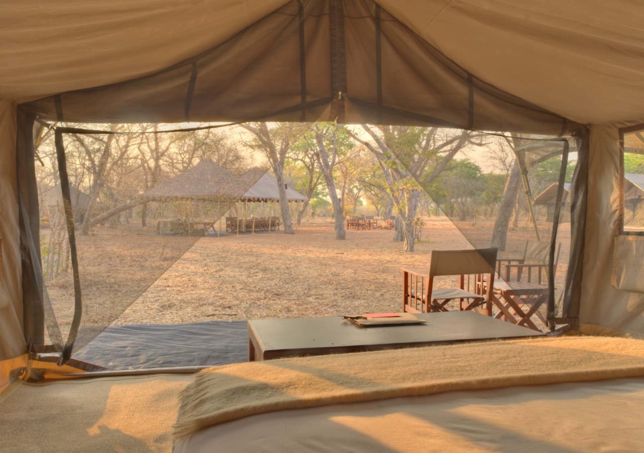 Chobe under canvas tent bedroom and view 1280