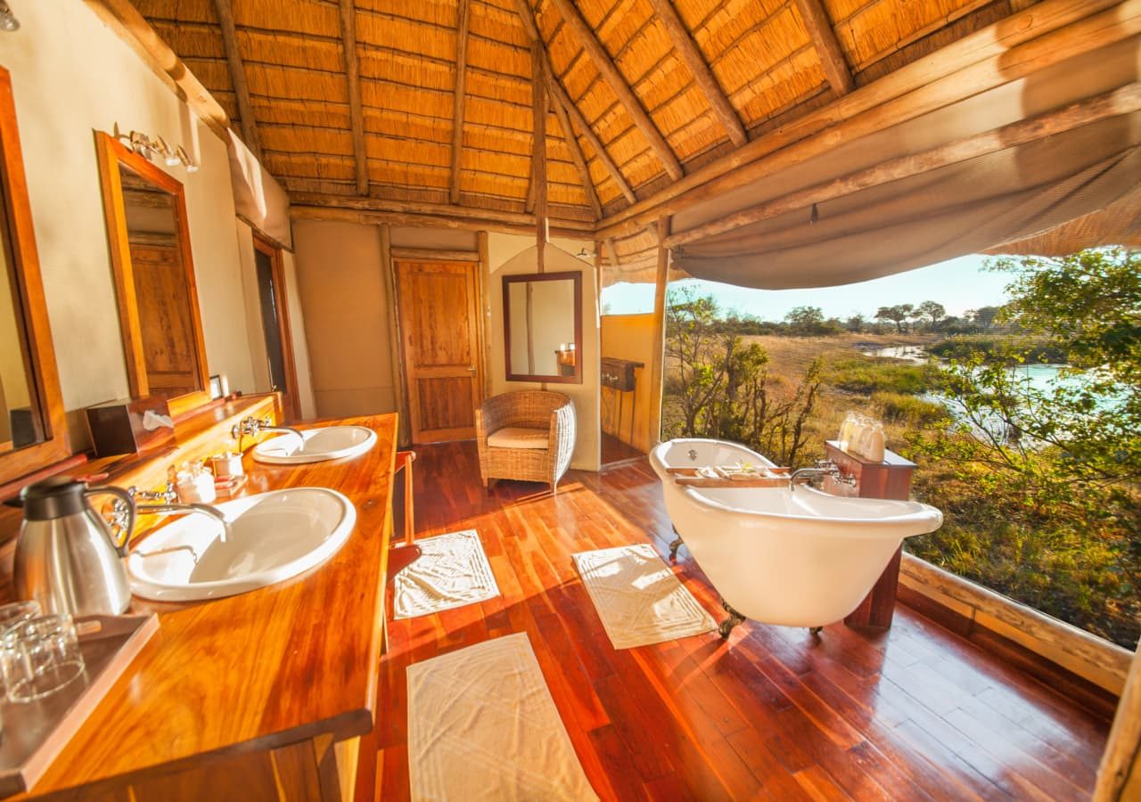 Lagoon camp bathroom and views from the bathtub 1280