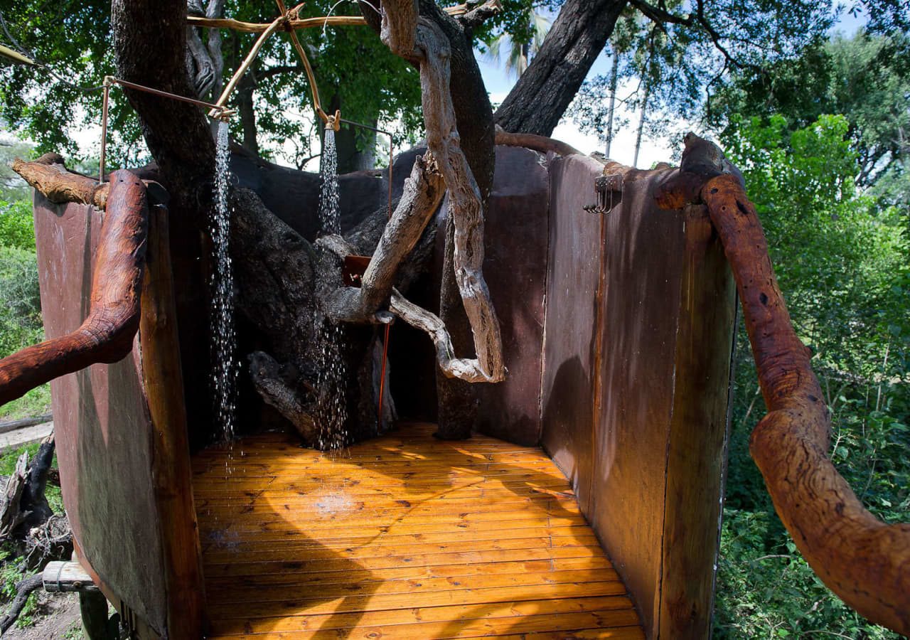 Tubu tree camp outdoor shower 1280