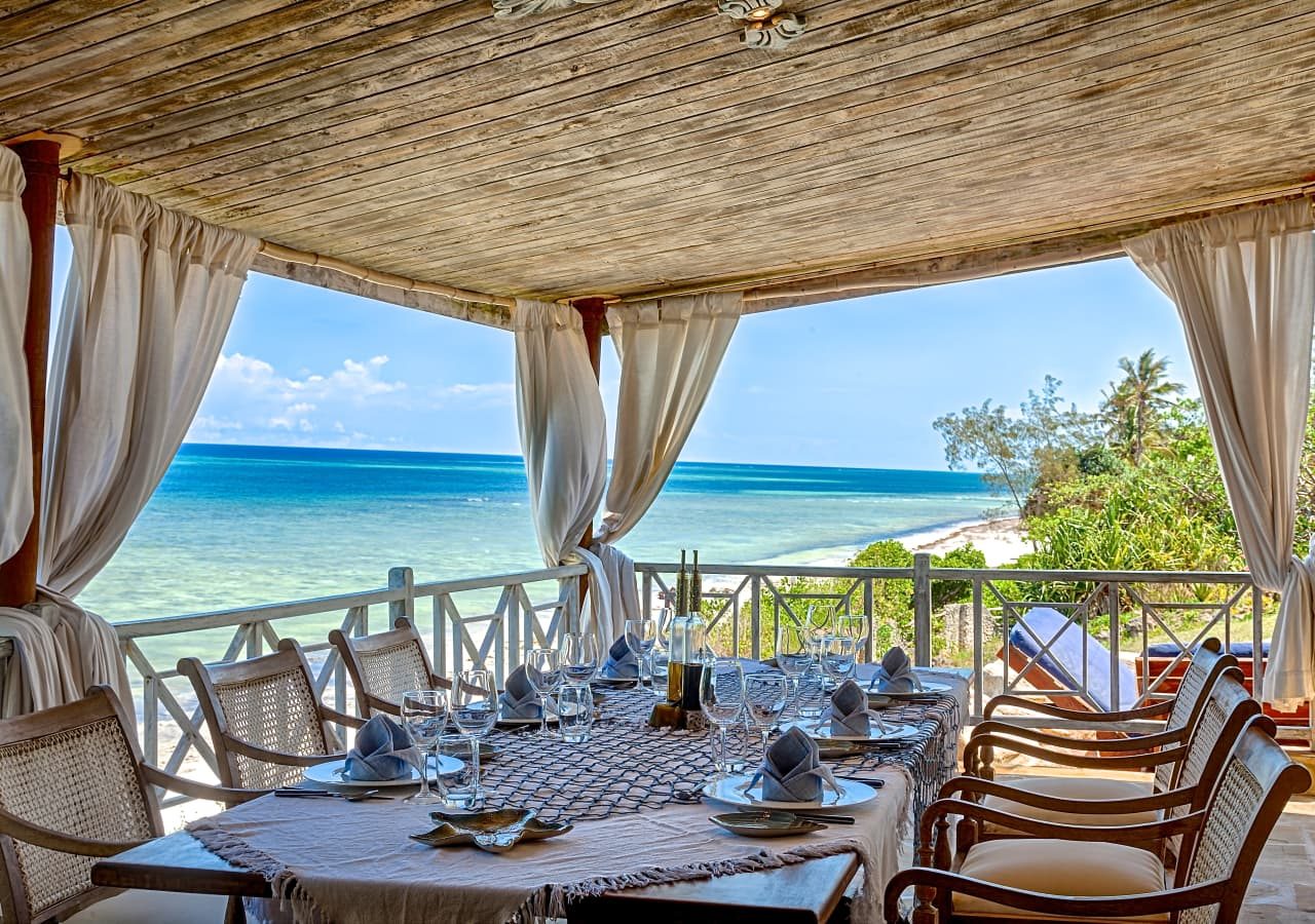 Alfajiri villas dining area by the beach 1280