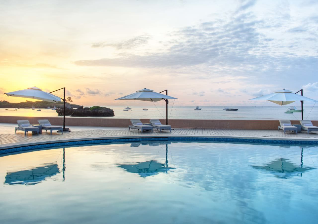 Hemingways watamu sunrise view of the pool 1280