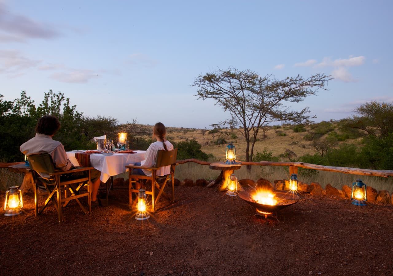 Lewa safari camp evening dinner with campfire 1280