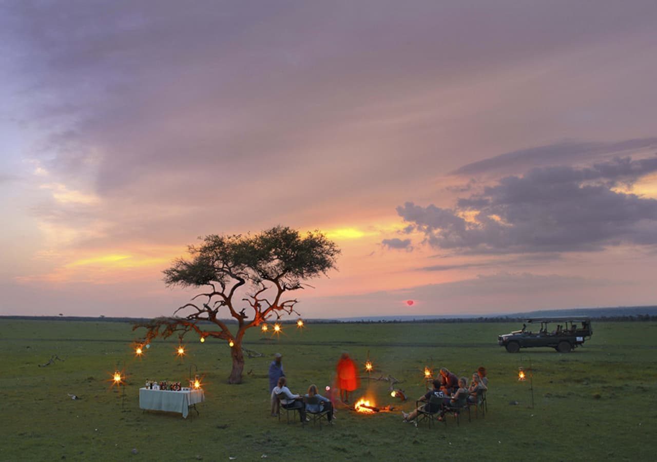 Asilia naboisho camp sundowners in the bush 1280