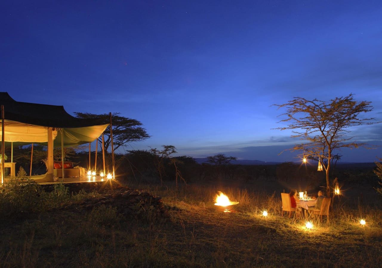 Kicheche valley camp romantic dinner setup 1280