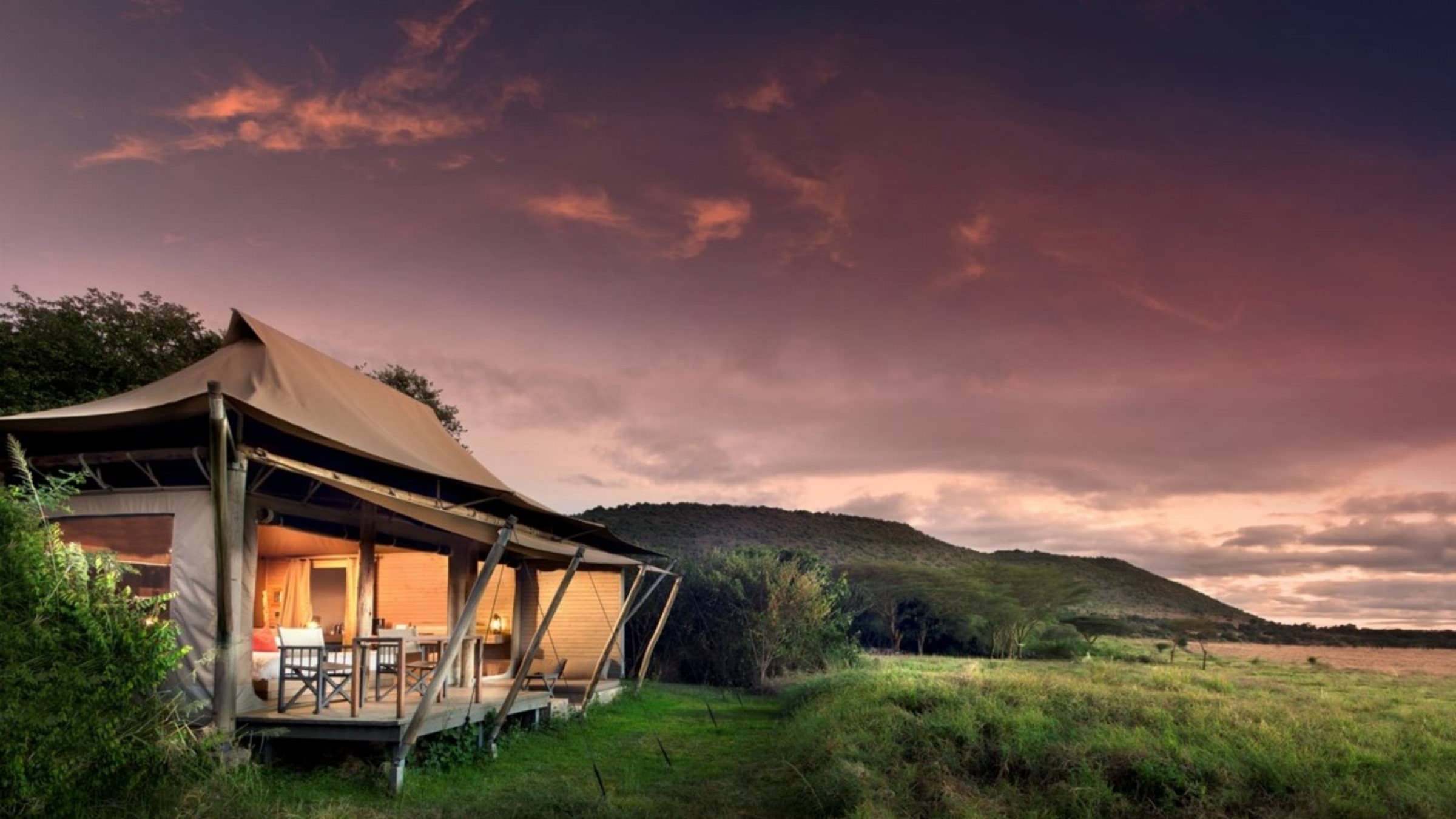 Kichwa tembo tented camp tent exterior at sunset 2400