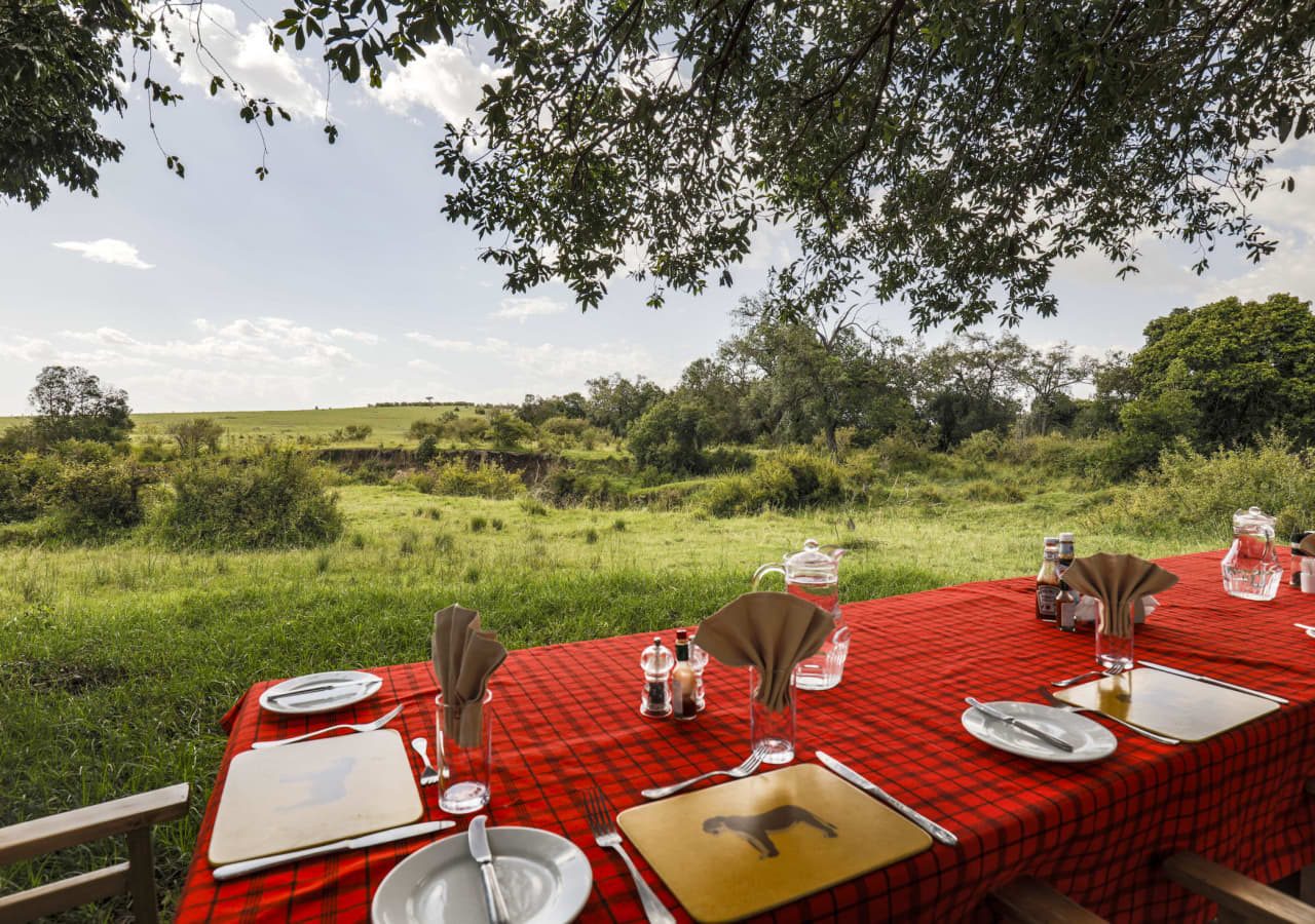 Porini lion camp outdoor dining views 1280