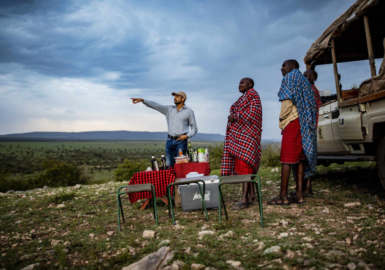 Porini mara camp sundowners after game drive 1280