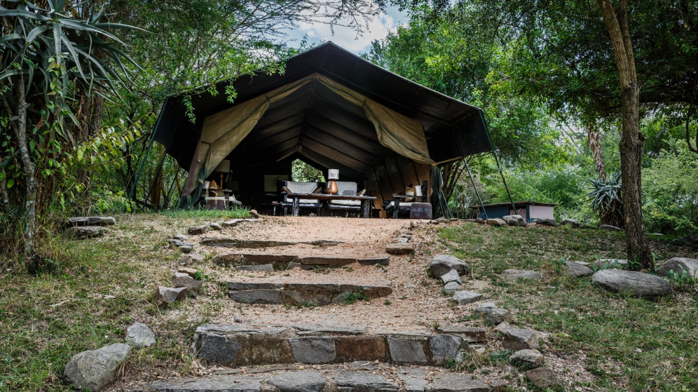 Porini mara camp pathway to lounge area 2400