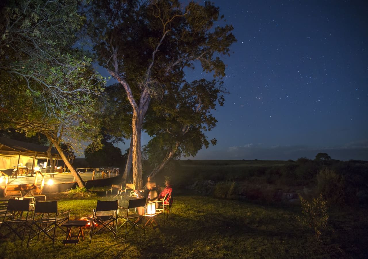 Rekero camp sundowners by the fire 1280