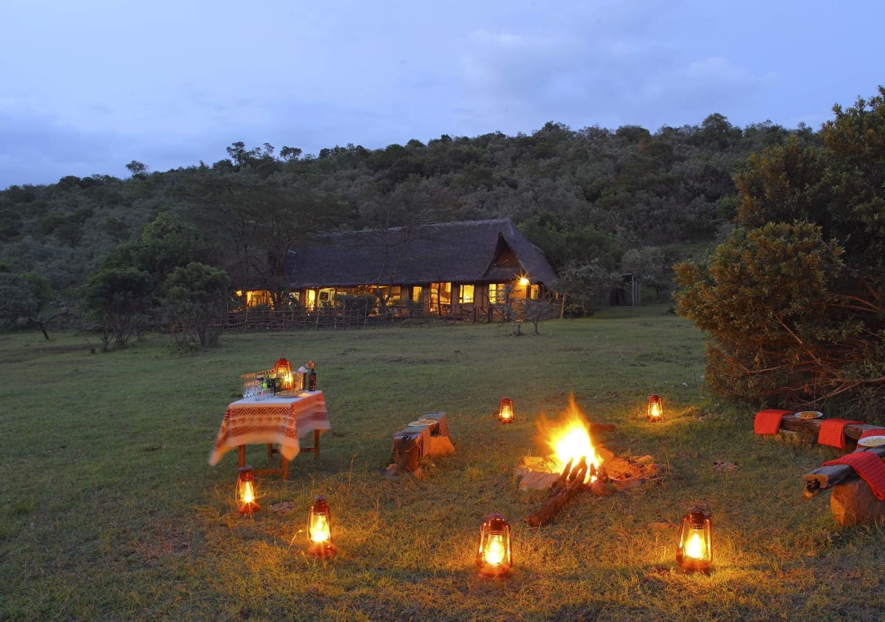 Saruni mara sundowner campfire 1280