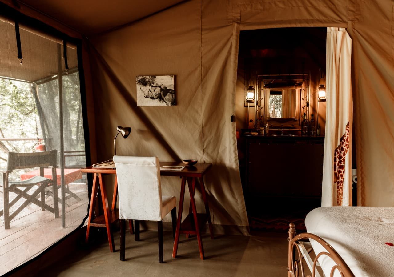 Nairobi tented camp desk area with a view of the verandah 1280