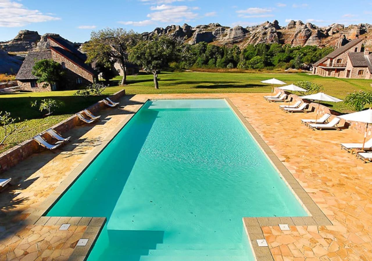 Le jardin du roy swimming pool and lounge area 1280