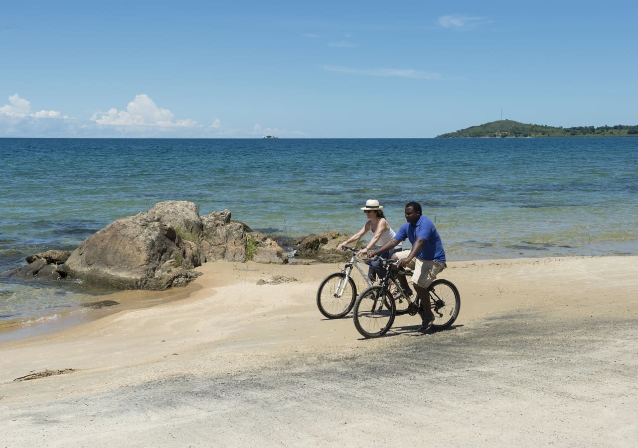 Chintheche inn biking experience on the beach 1280