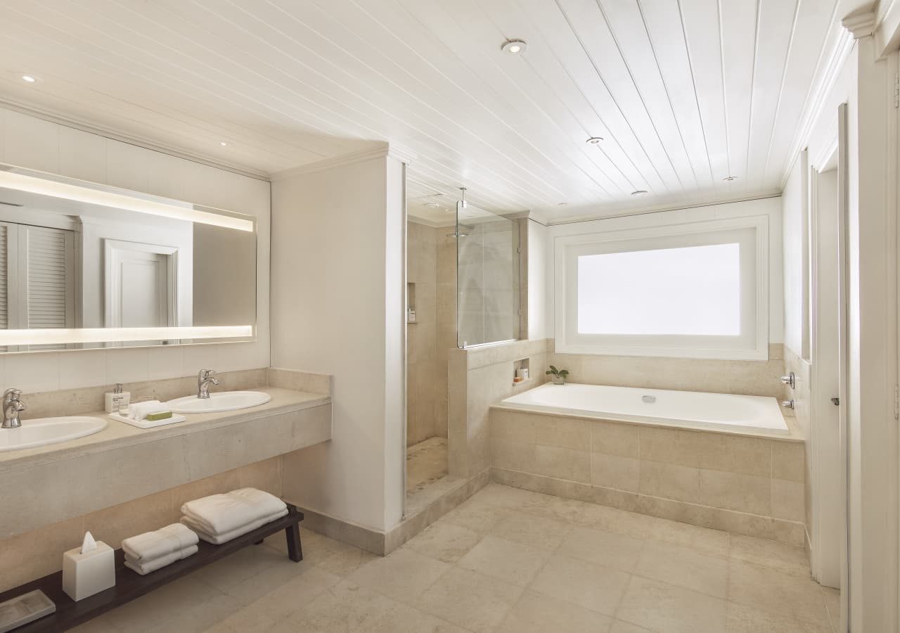 Lux le morne bathroom with a bathtub 1280