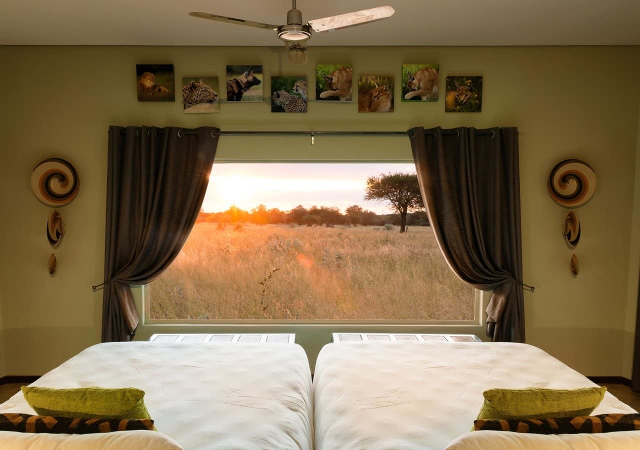 Okonjima plains camp twin room view from the bed 1280