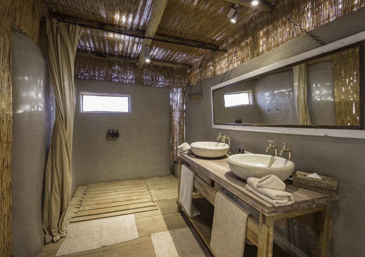 Damaraland camp guest bathroom 1280