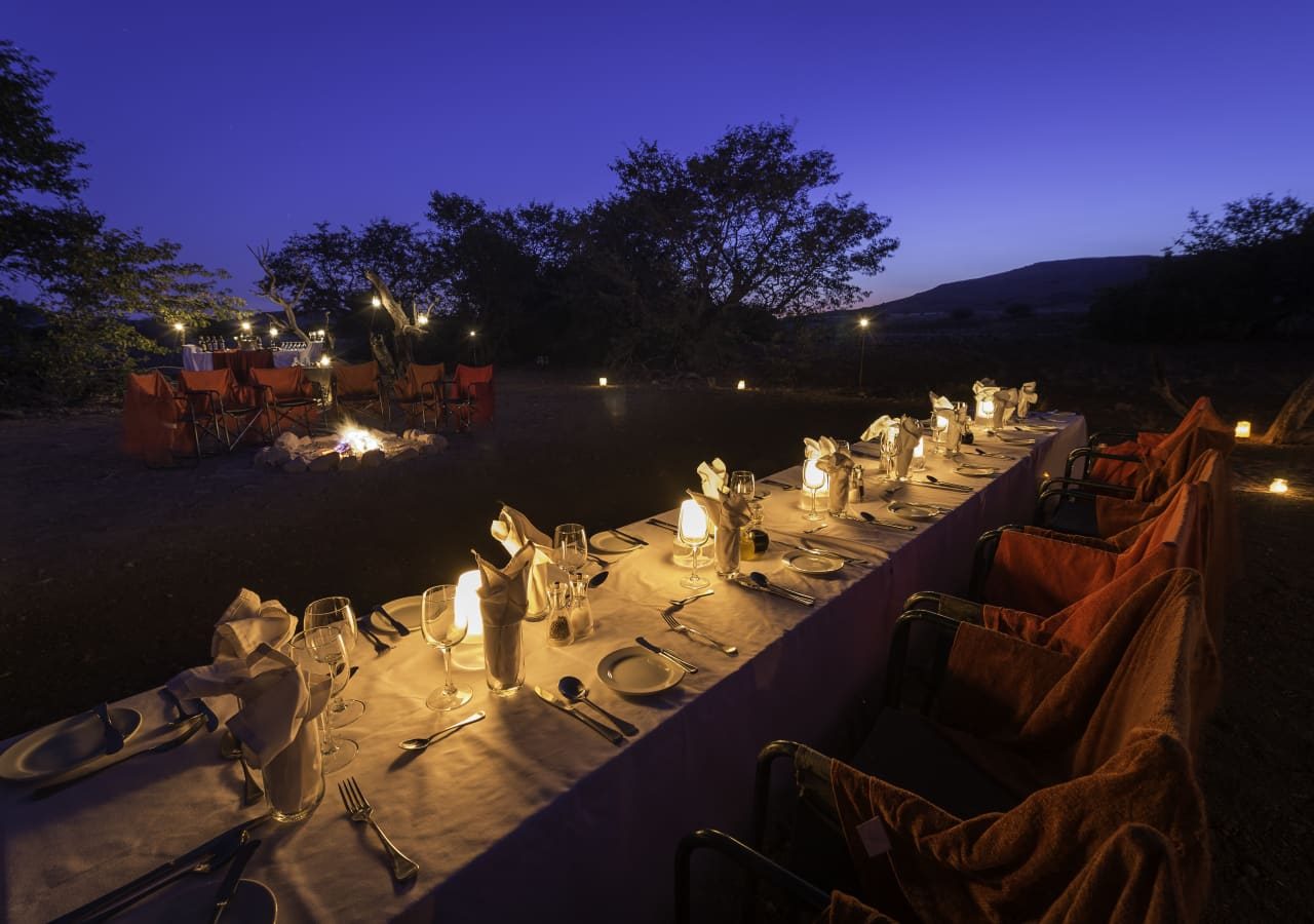 Desert rhino camp dining under the stars 1280