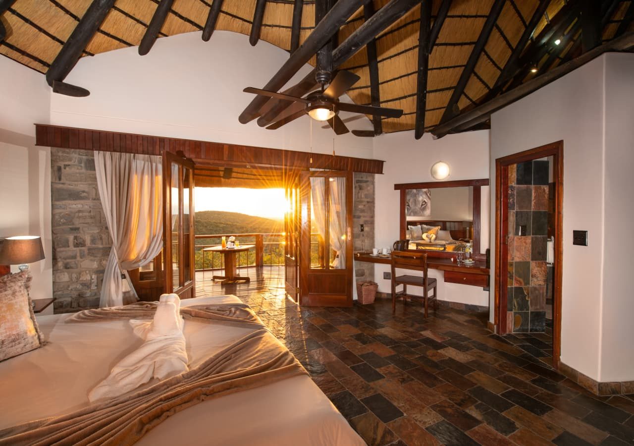 Etosha mountain lodge bedroom at sunrise 1280