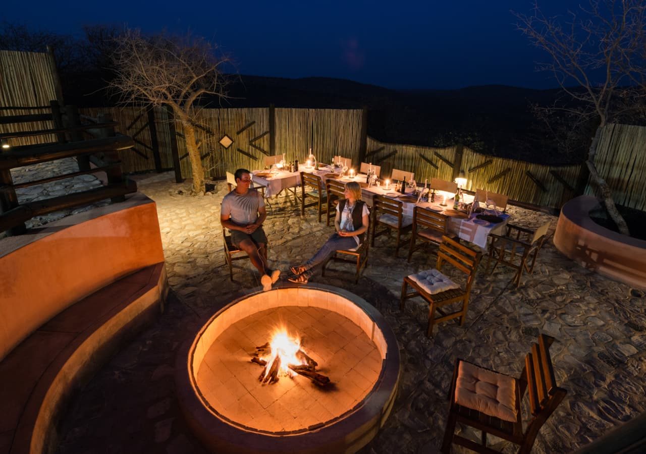 Etosha mountain lodge firepit and evening lounge 1280