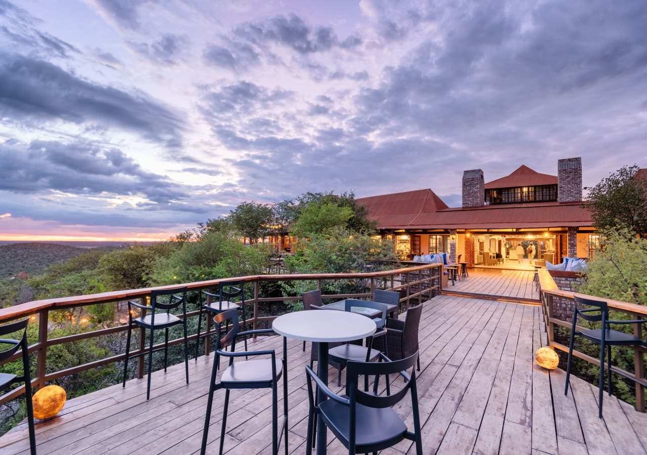 Etosha safari lodge outside deck at dusk 1280