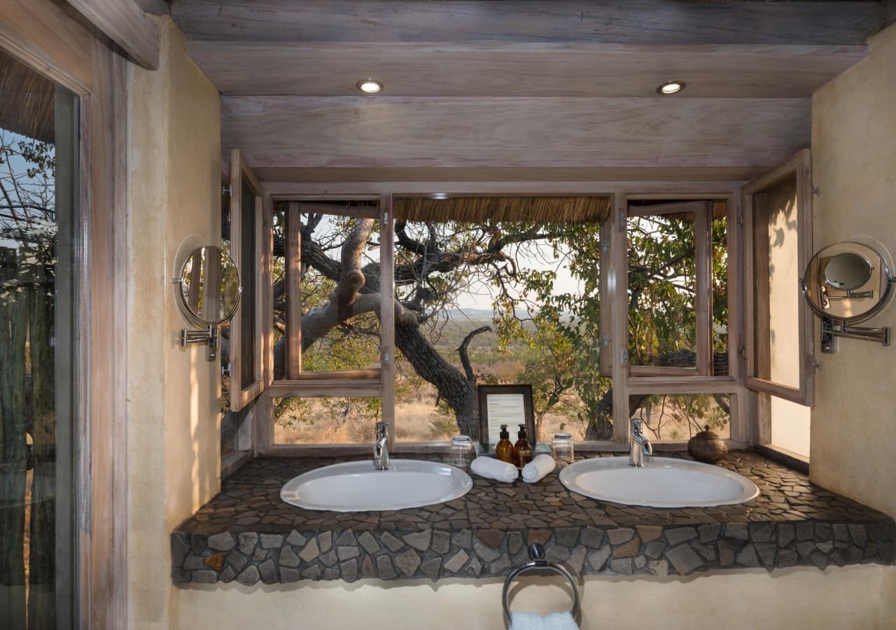 Ongava lodge bathroom in guest lodge 1280