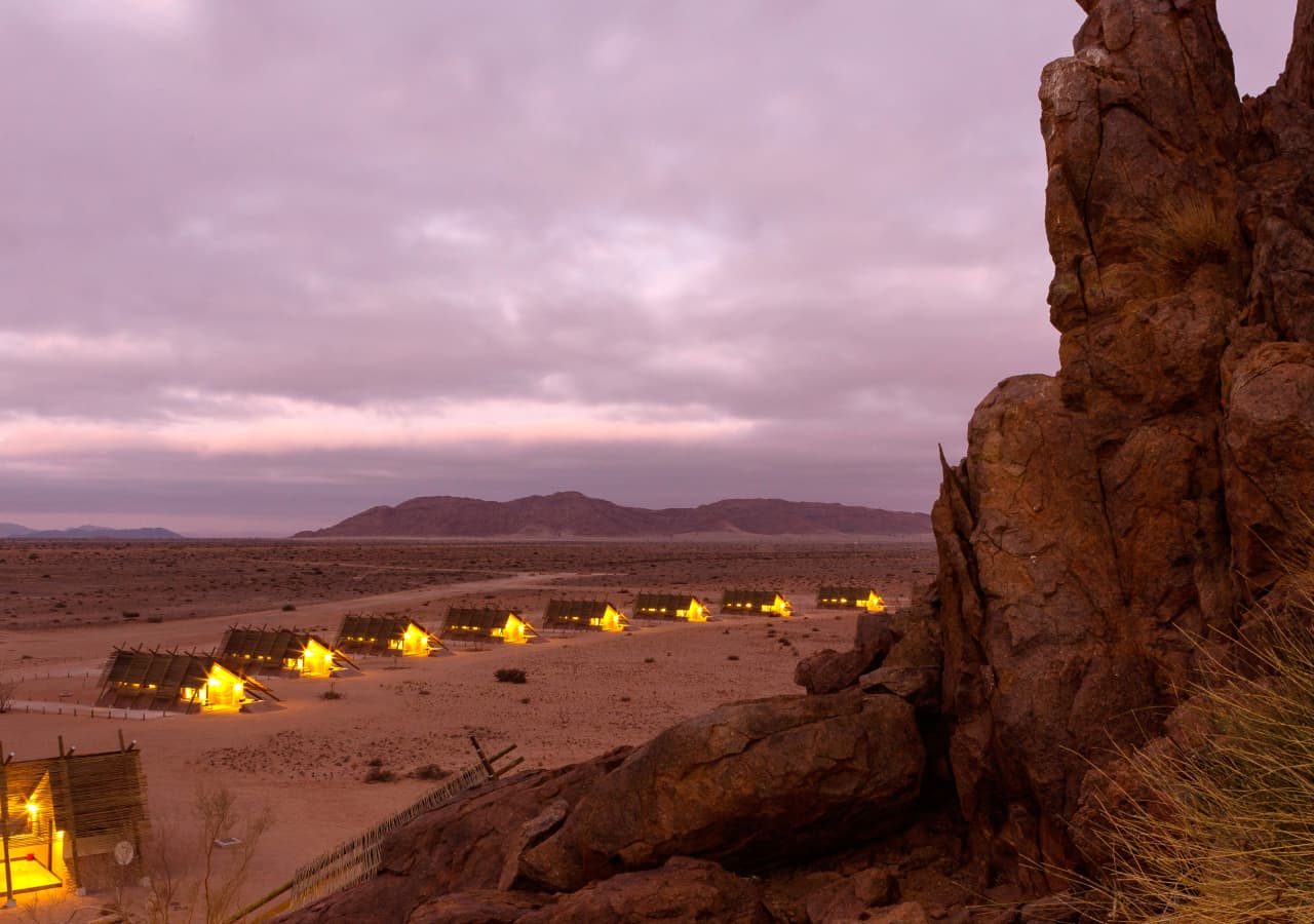 Desert quiver camp aerial view of camp at sunset 1280