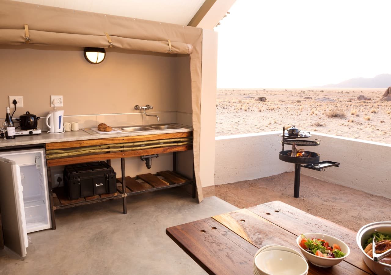 Desert quiver camp outdoor patio and kitchen 1280