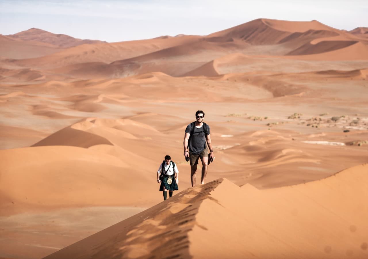 Namib desert lodge walking the dunes 1280